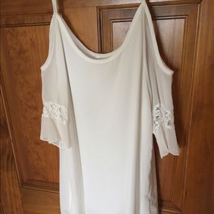 shoulder-less white dress with lace trim