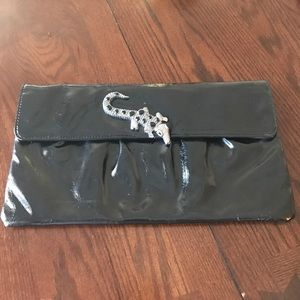 Large black patent leather clutch