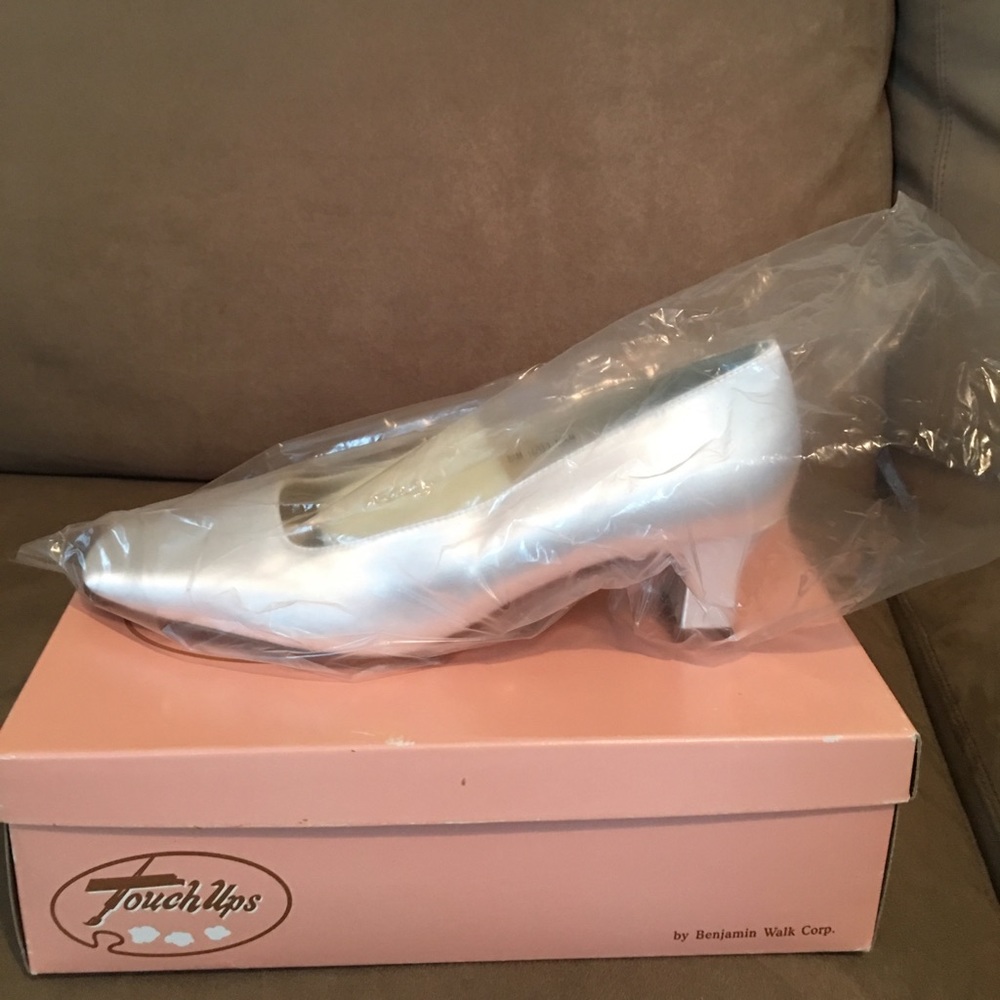 Dye able white satin shoes.