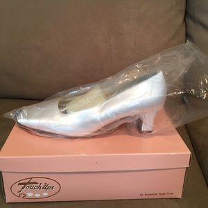 Dye able white satin shoes.