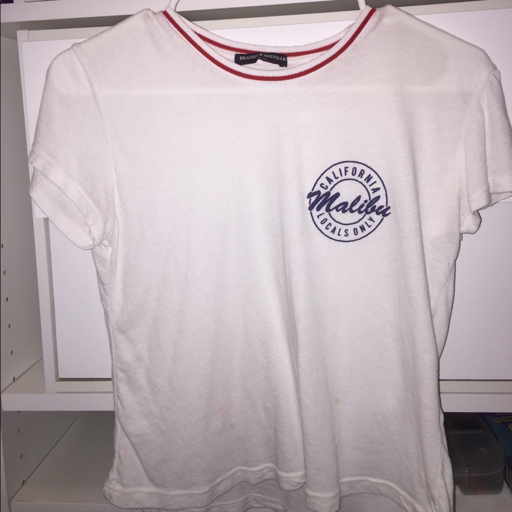 Brandy Melville white Malibu t-shirt.