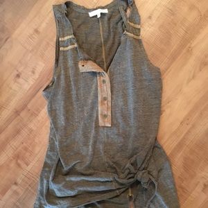 Gilded intent tank from the buckle