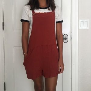 orange fabric overalls