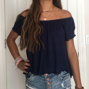 navy off the shoulder flowy shirt