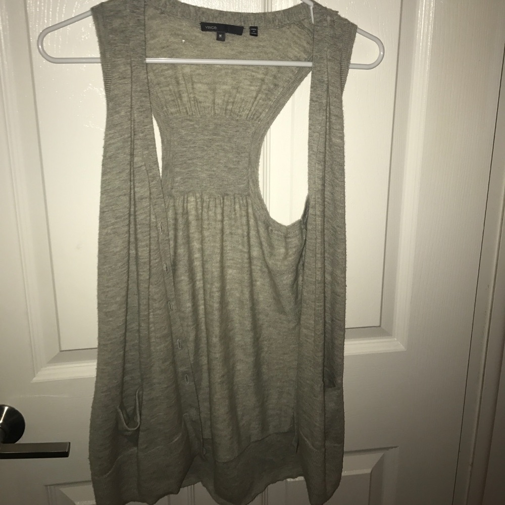 Grey vest.