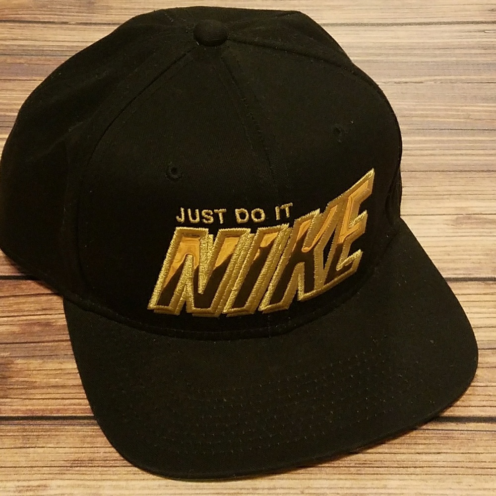 Authentic Nike Black and Chrome Gold Hat