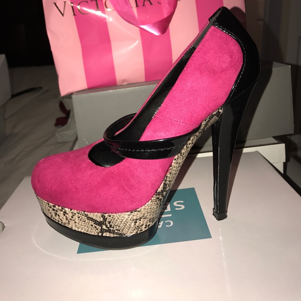 Fuscia, black, and snake skin pumps