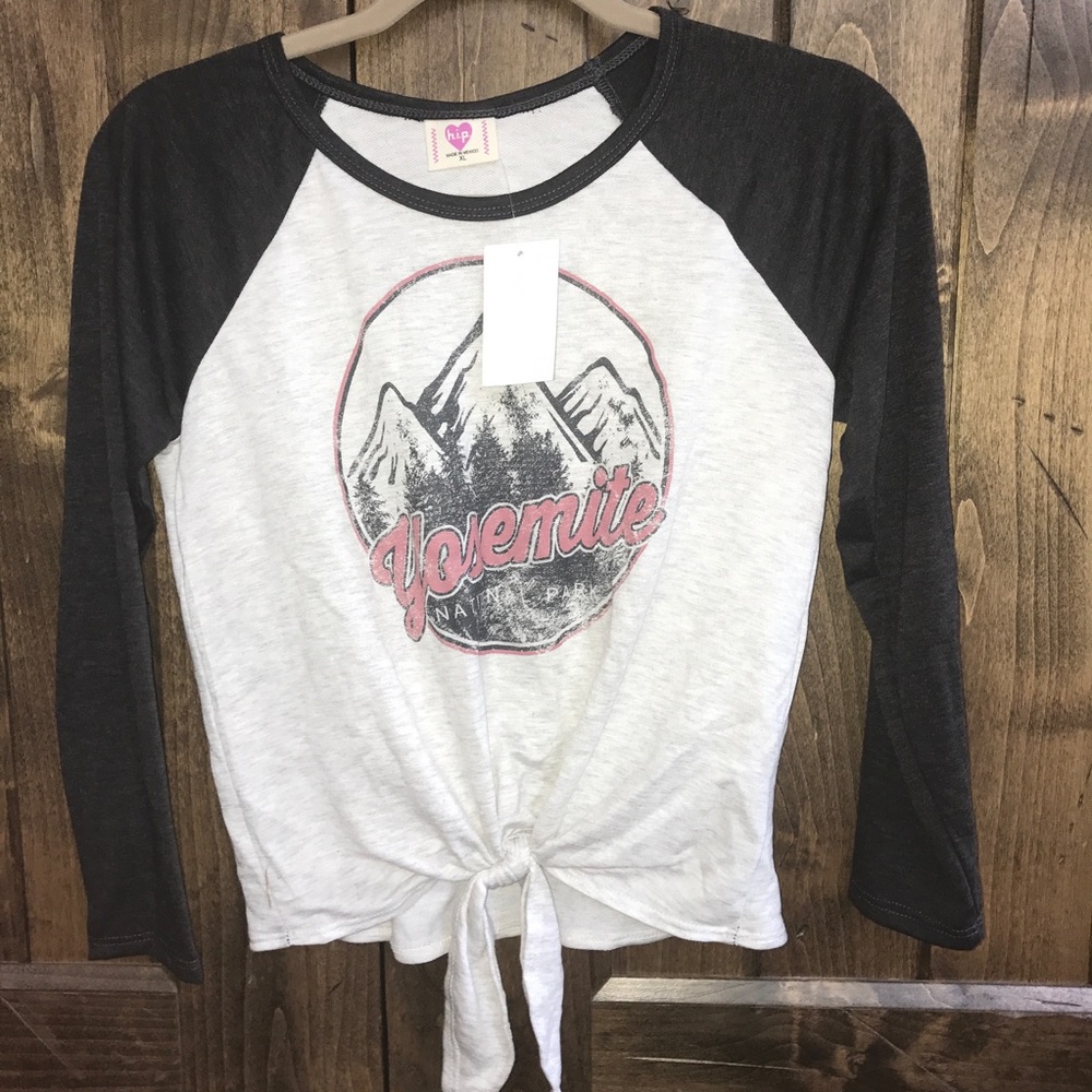 Never worn 3/4 sleeve baseball type tee