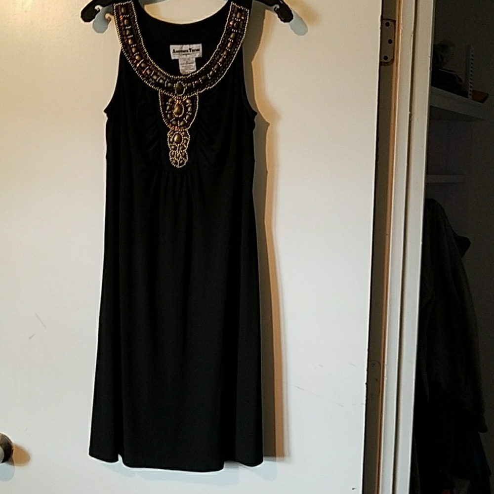 Black dress with embellished neckline...blend of