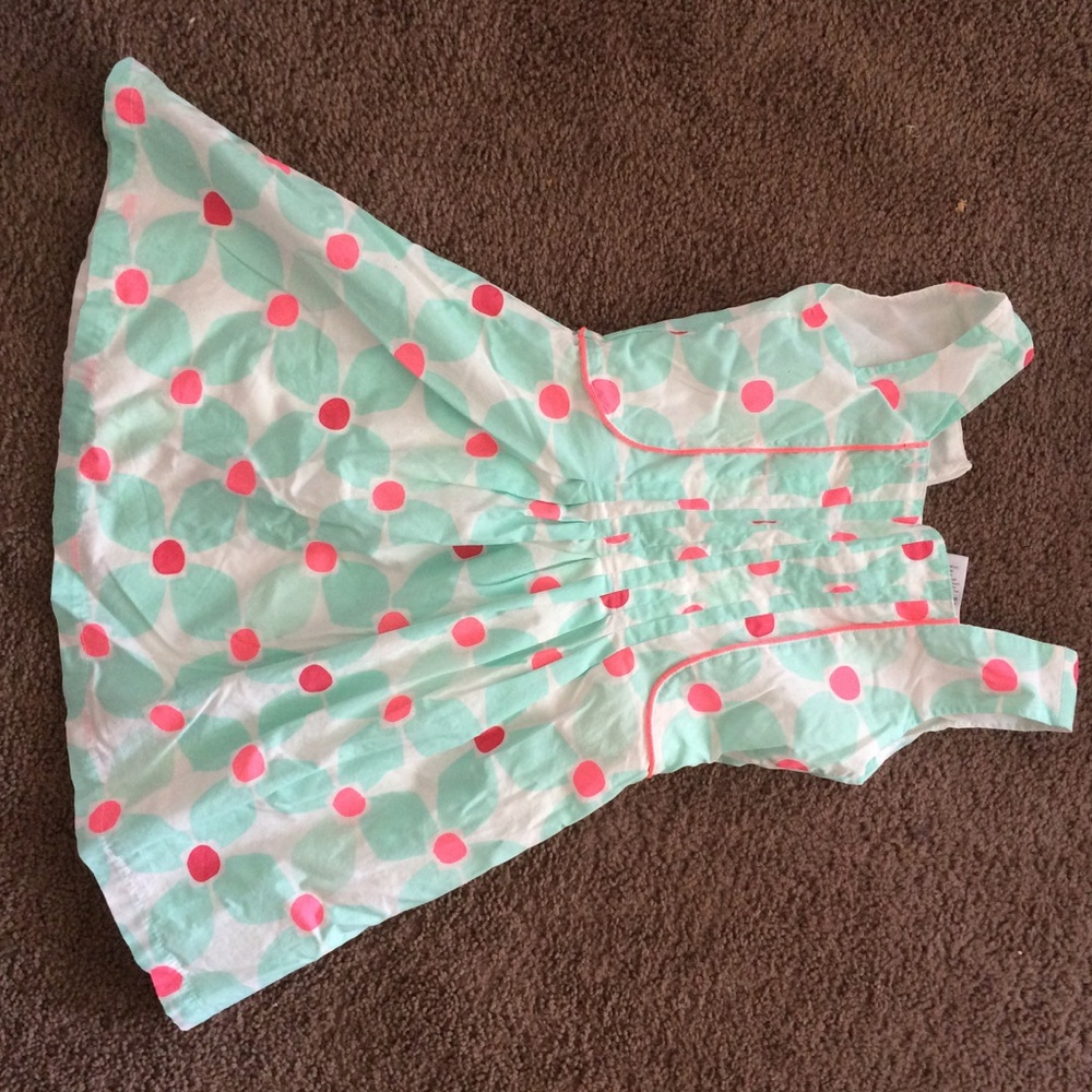 Adorable dress with detailing.