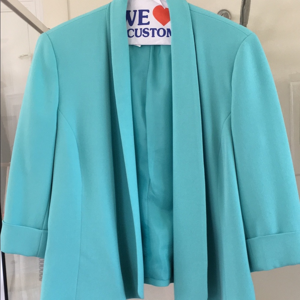 Sea foam green relaxed jacket.