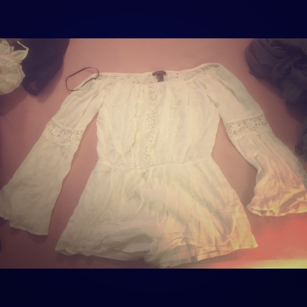 White Romper with Crotchet detail and bell sleeves