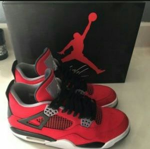 Red Jordan 4's Retro