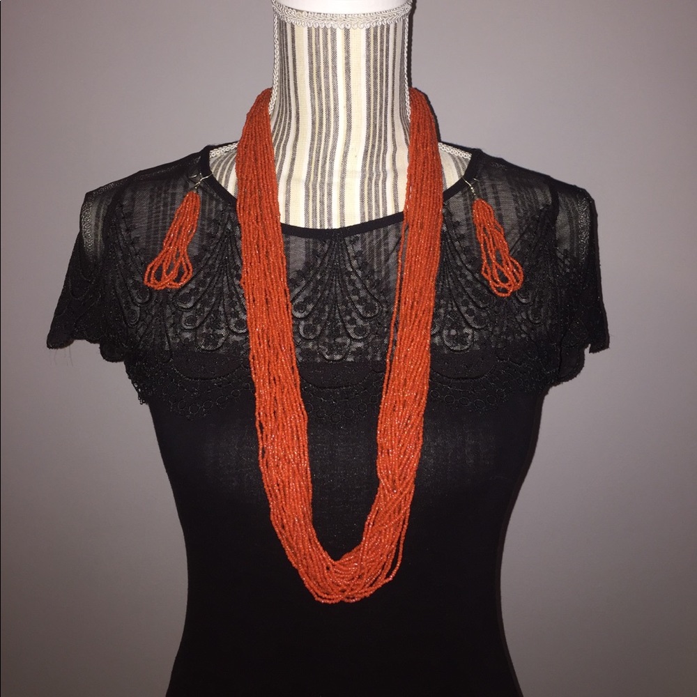 Orange Beaded necklace and earrings