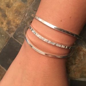 Silver bangle.