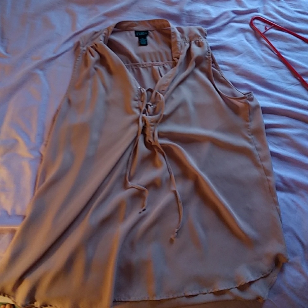 Sleeveless blouse.