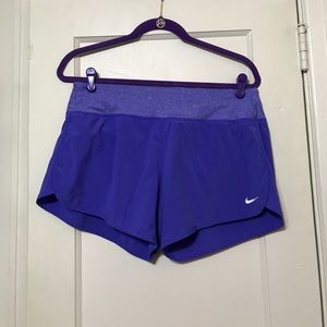 Purple Nike Rival 5” running shorts