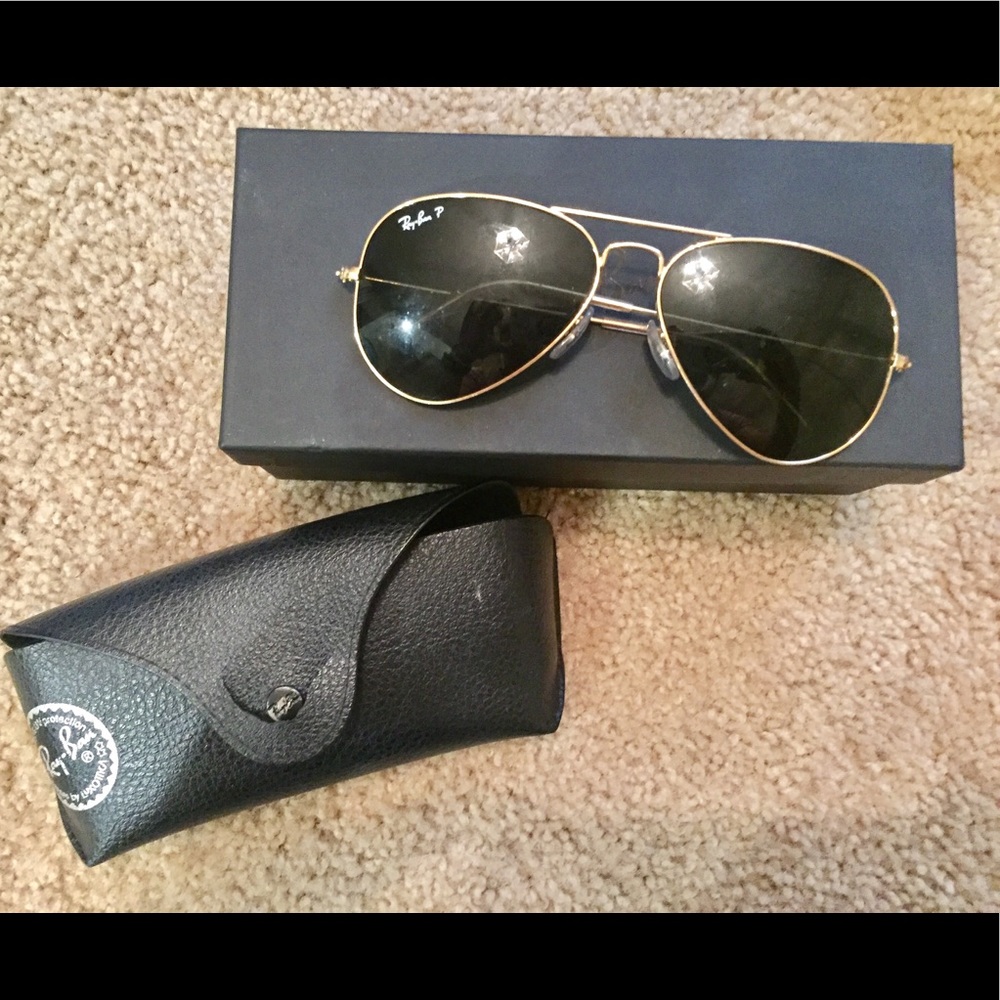 SOLD Polarized black raybans with gold frames