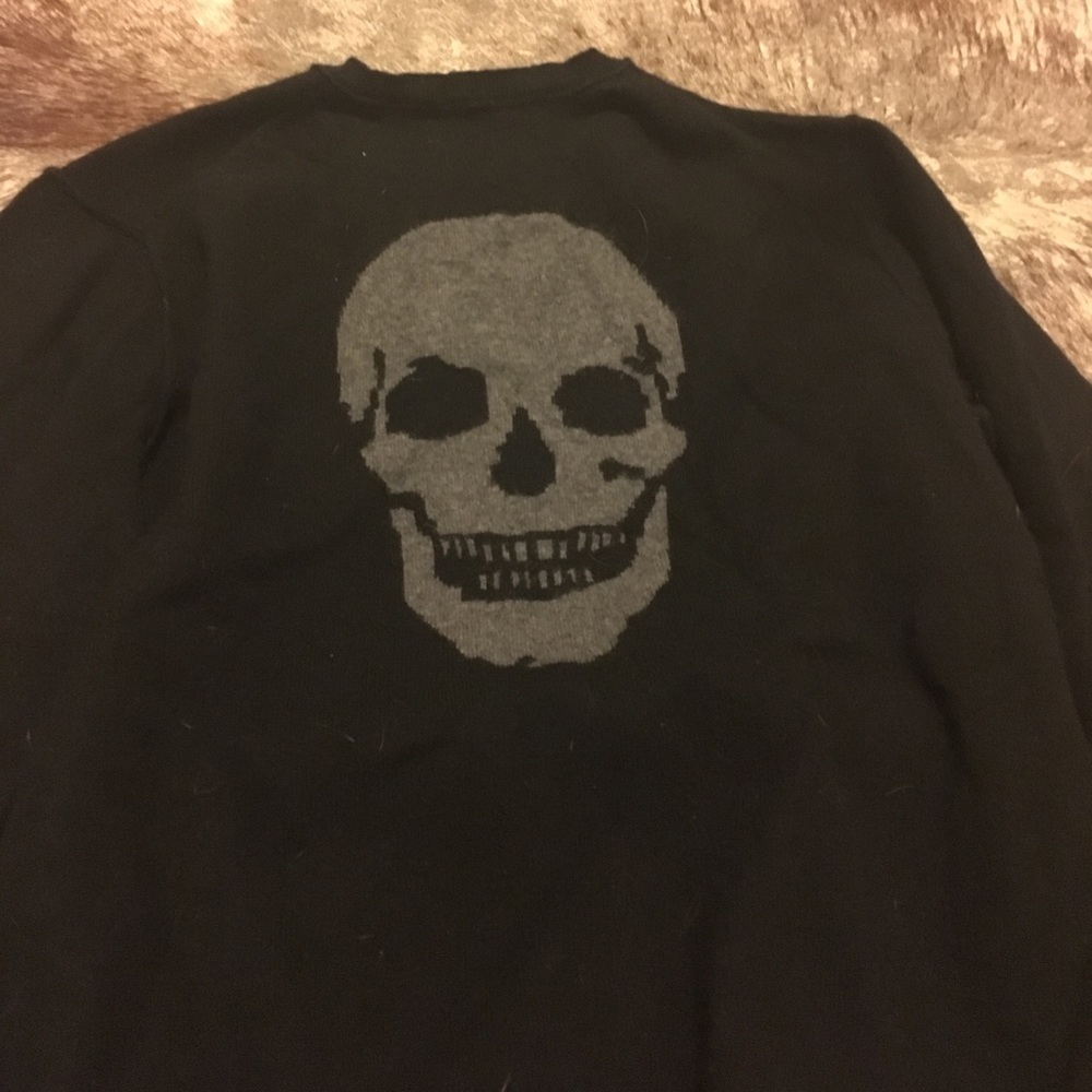 Black cashmere sweater with skull design on back
