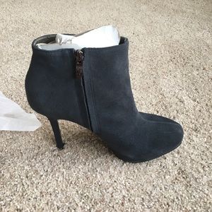 Loft high heel boots. Run small. May fit a 9-9.5.
