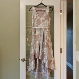 Worn once for a wedding.