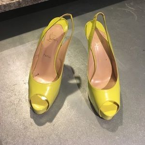 Chartreuse sling back peep town Louboutins