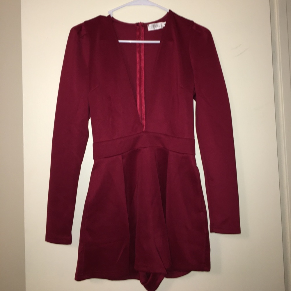 Red long sleeve deep cut romper ❤️