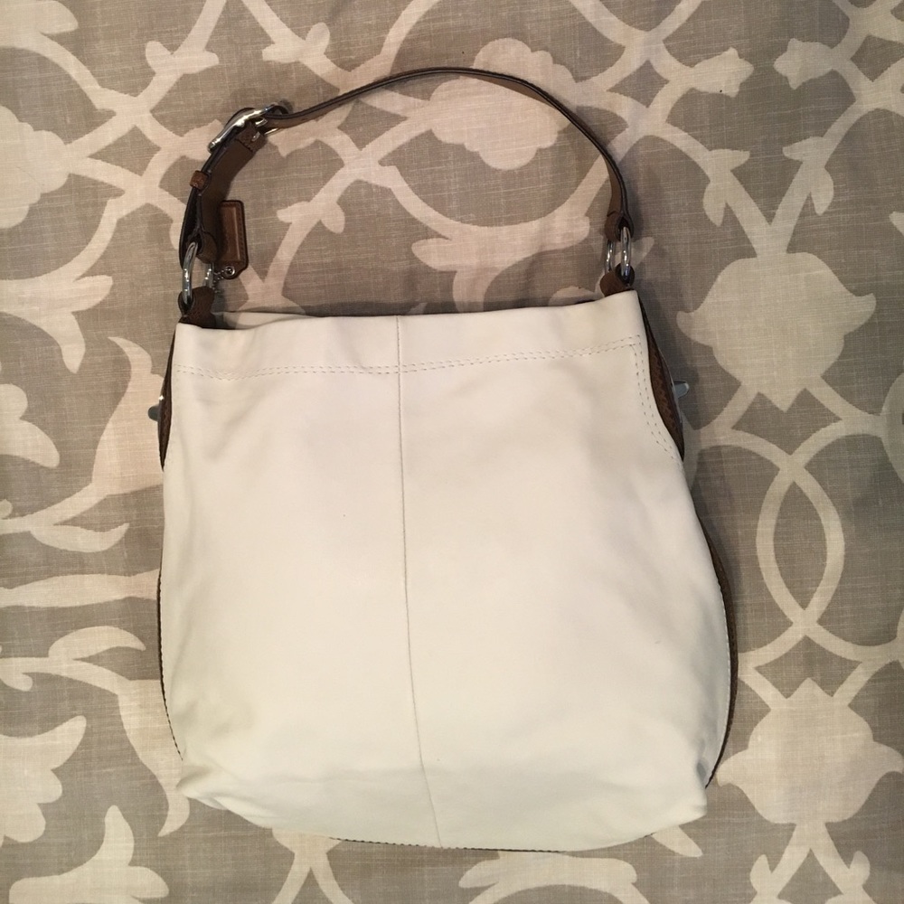 Like new Coach Hobo bag. Off-white w/brown strap