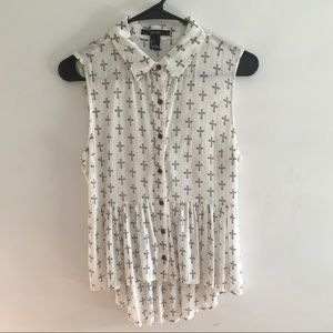 Sleeveless collared shirt w/ crosses