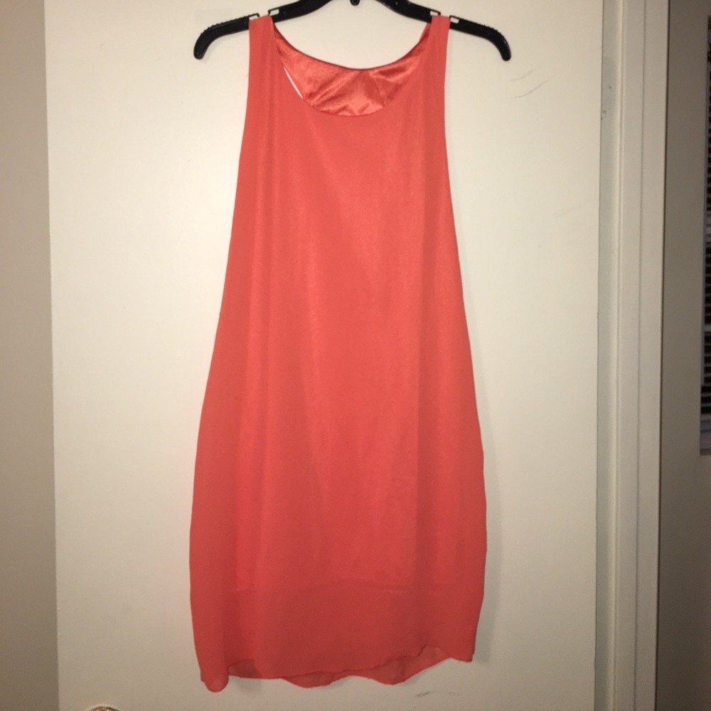 Orange bow-back sleeveless dress