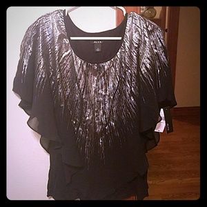 Never worn before elegant top.