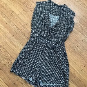 Capped sleeve romper. Worn once. Like new. Size L