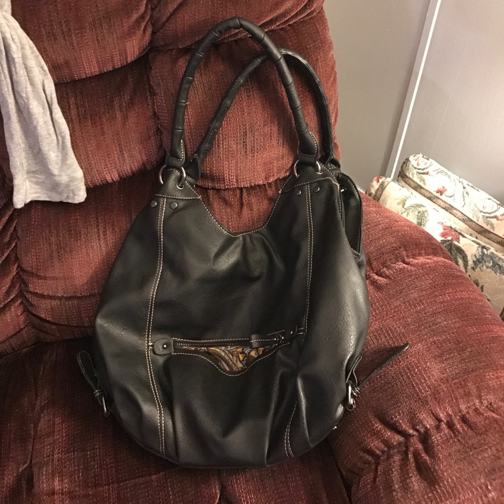 Black Rivet brand handbag. New without tags