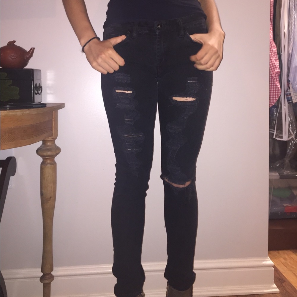 Black ripped mid-rise skinny jeans by Blank NYC
