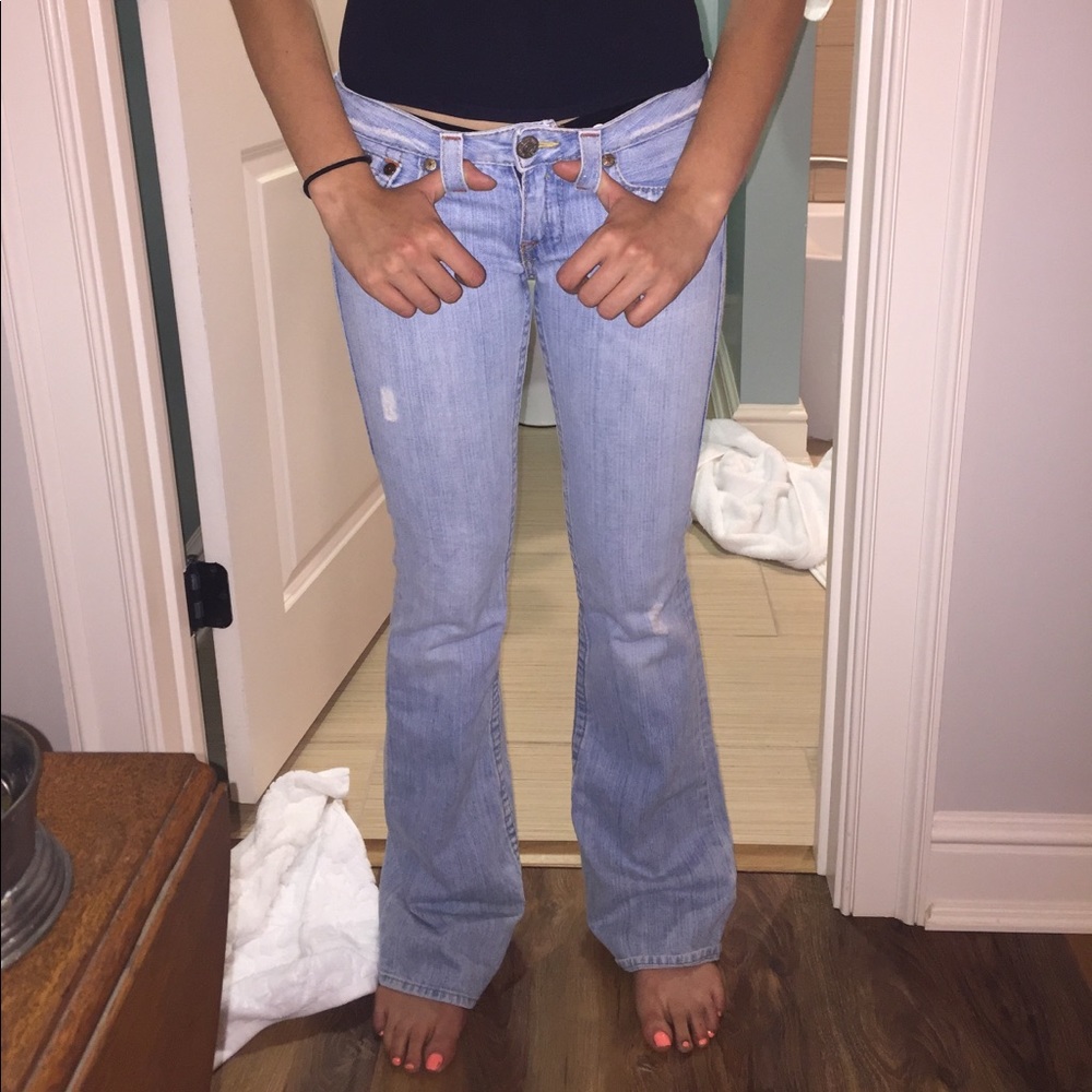 Super low rise light wash bootcut jeans