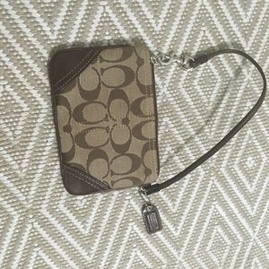 Coach logo wristlet.