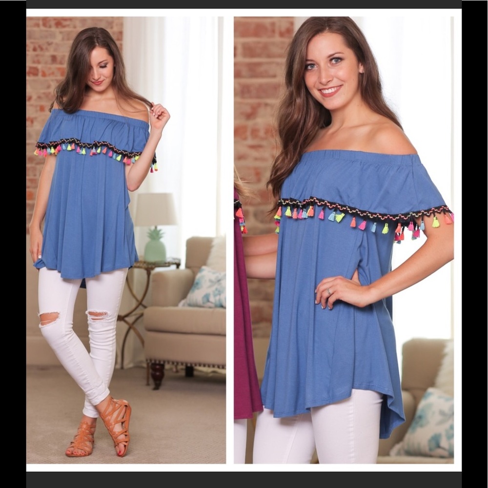 Blue off the shoulder blouse w/ pompoms