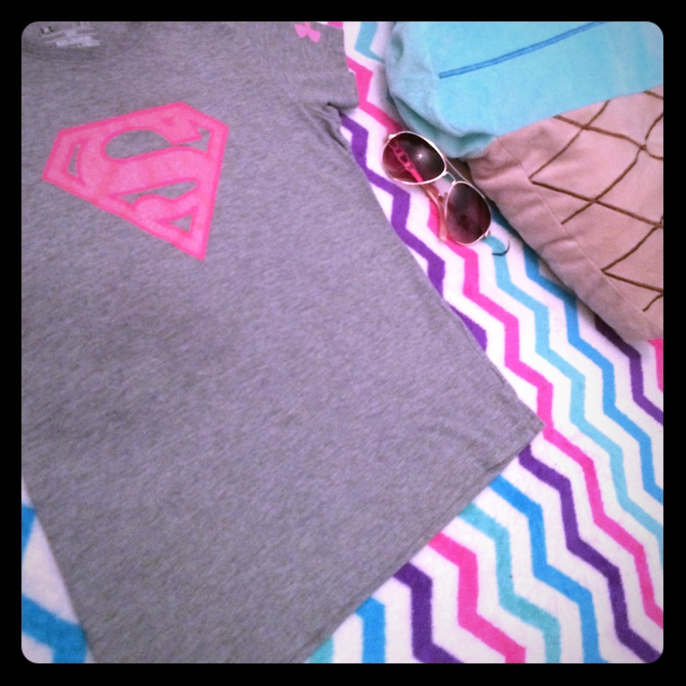 This is a under armor super girl shirt.