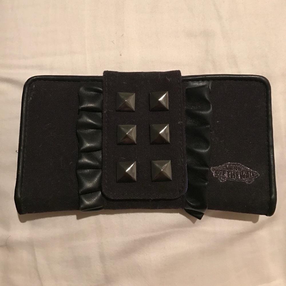 Black Vans wallet with ruffle and pyramid studs