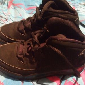 Boy's all black Jordan's