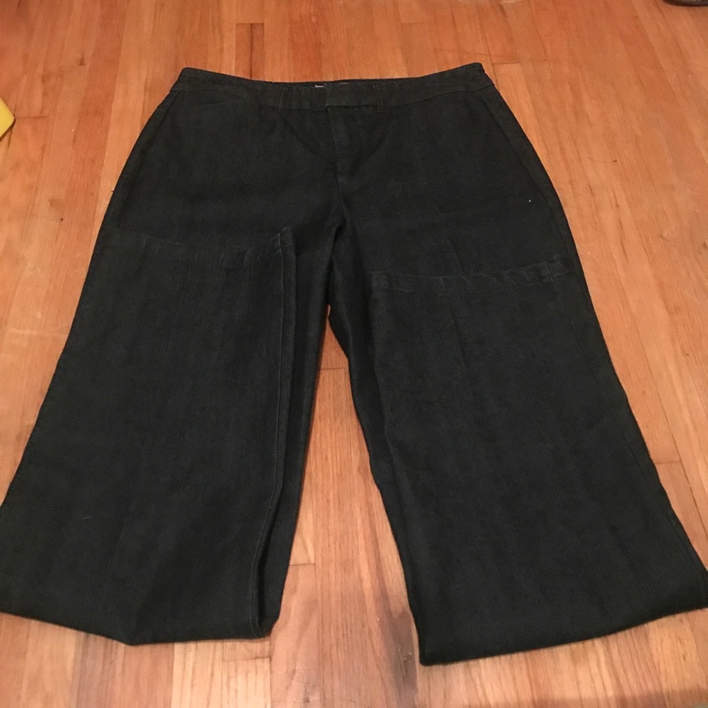 Dark wash denim slacks.