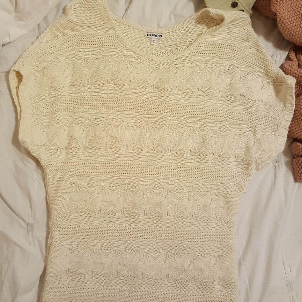 Cream colored knitted tunic