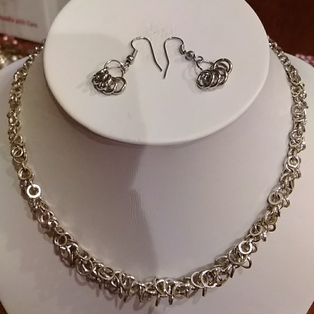 Silver ring necklace and earrings