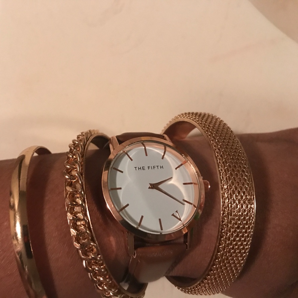 Fashion watch and 3 gold tone bracelets