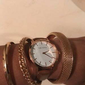Fashion watch and 3 gold tone bracelets