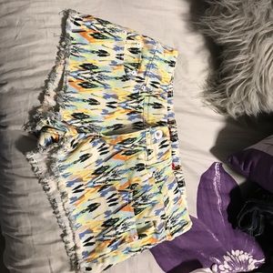 patterned shorts with slight fringing at bottom