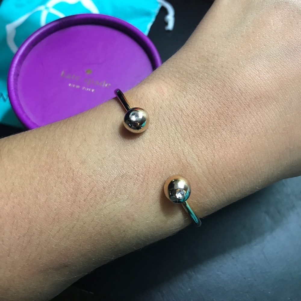 Gold Kate spade bracelet.