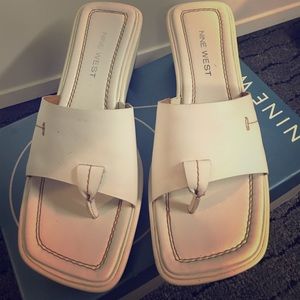 White wedge flip flops