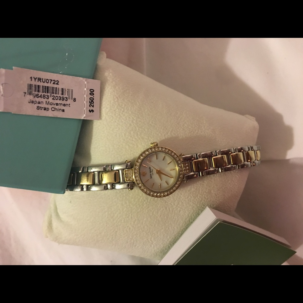 Silver and gold Kate spade watch.