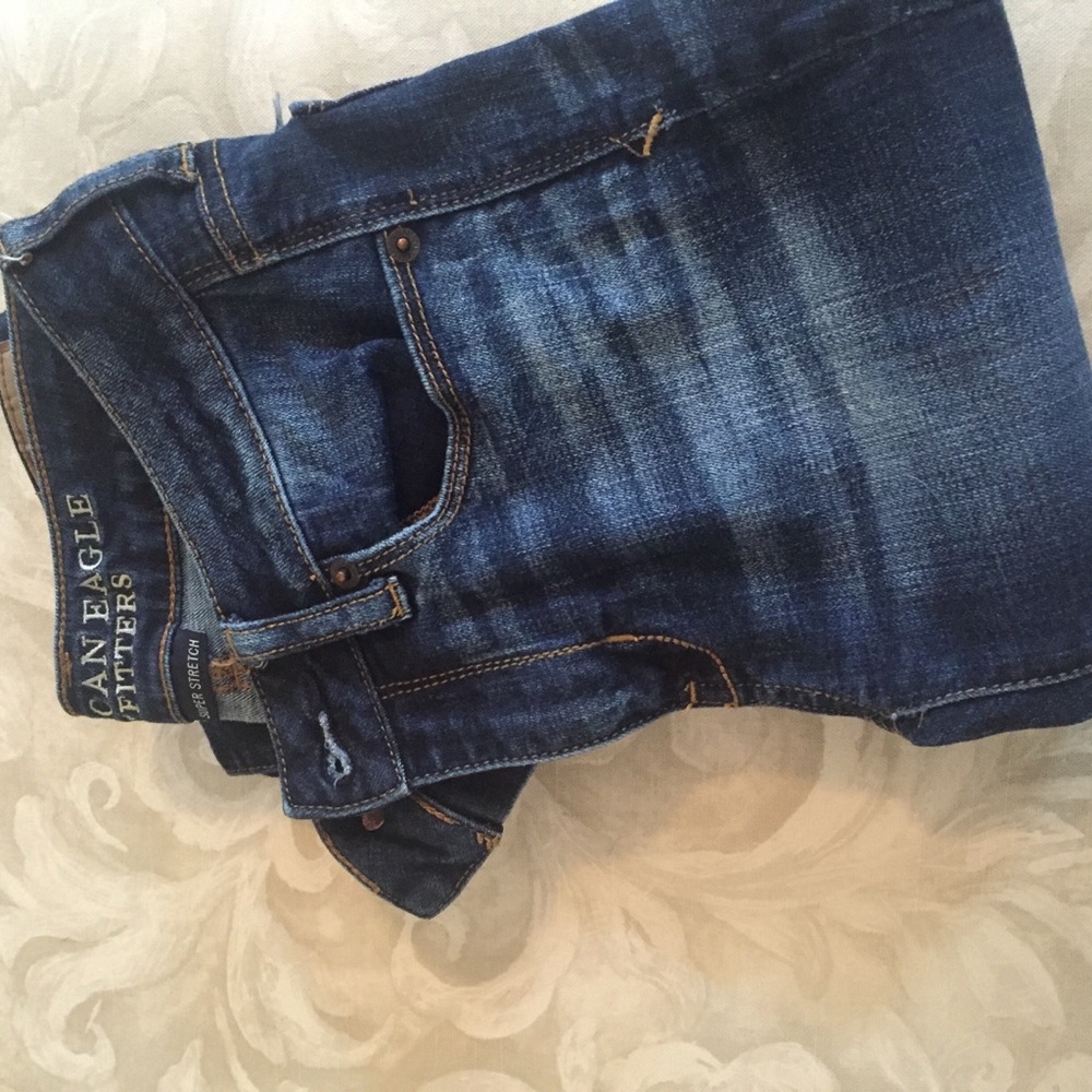 AE dark wash skinny kick jeans